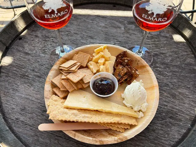 Cheese and cracker platter with wine.